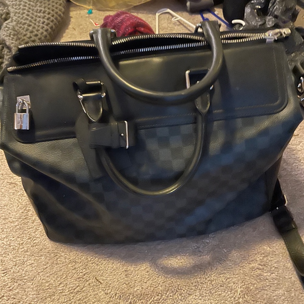 Louis Vuitton Travel Bag.